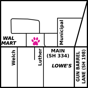 On Main Street, West of Gun Barrel Lane between Luther and Rodney